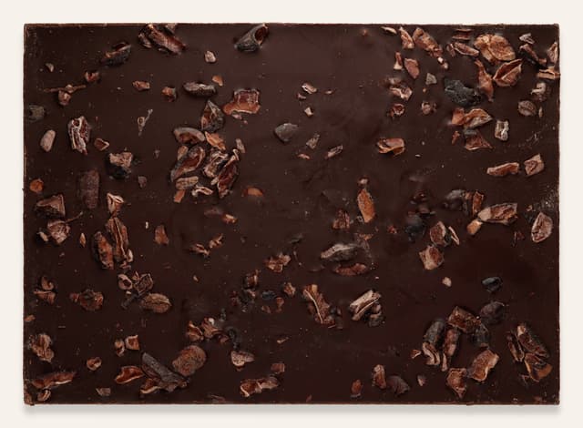 Back of 67% Cacao Nibs bar made by Olive & Sinclair Chocolate Co in the United States