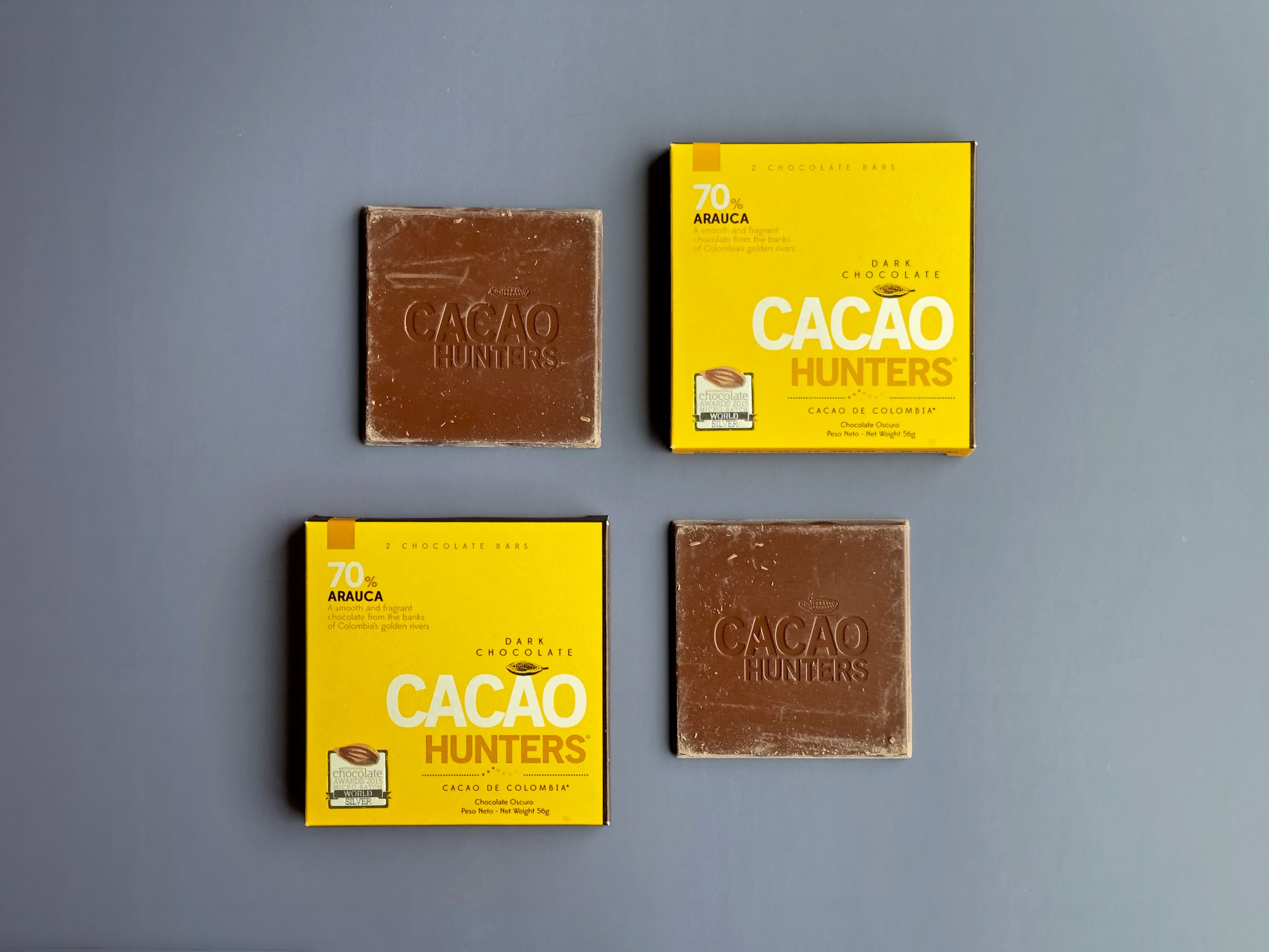 70% Arauca bar made by Cacao Hunters in Colombia arranged as a grid on a blue background