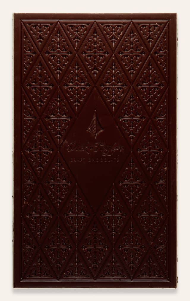 Front of 70% Dark with Black Fig bar made by Dick Taylor in the United States