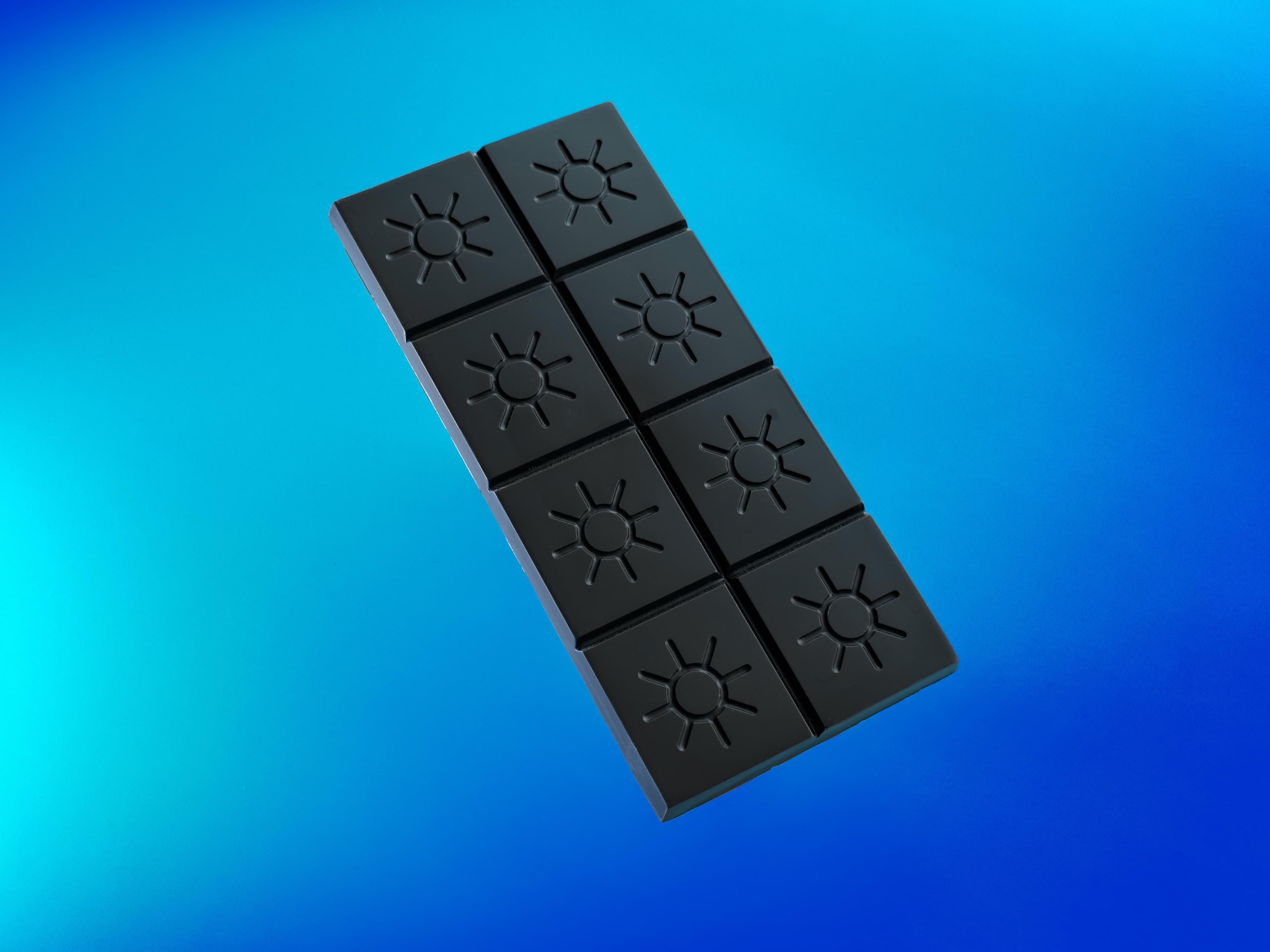 70% Rio Claro Dark Chocolate bar made by Solstice Chocolate in the United States floating on a gradient blue background