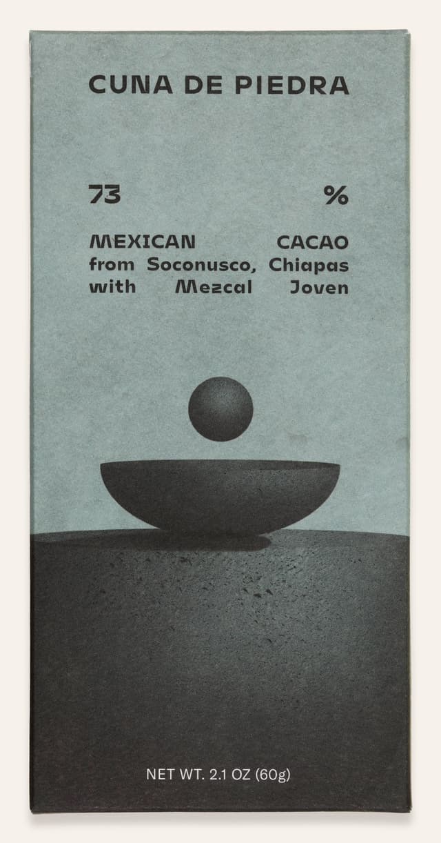 Front of 73% MEXICAN CACAO from Soconusco, Chiapas with Mezcal Joven bar made by CUNA DE PIEDRA in Mexico package