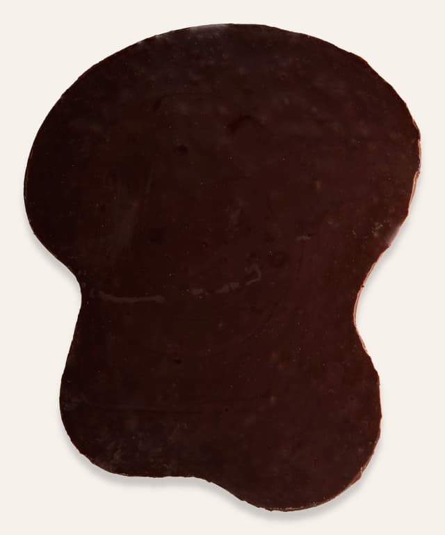 Back of Citrus Licorice Crunch bar made by Chocolate Naive in Lithuania