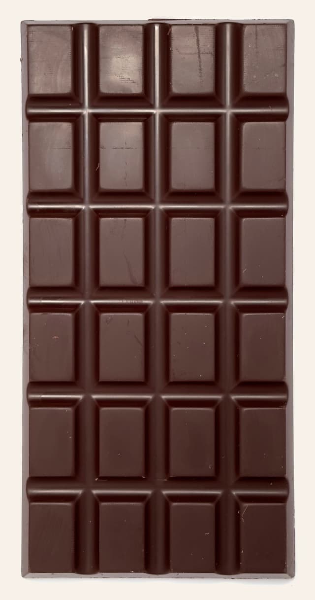 Front of Dominican Republic Dark 72% bar from Schoki Chocolate with a traditional mold pattern