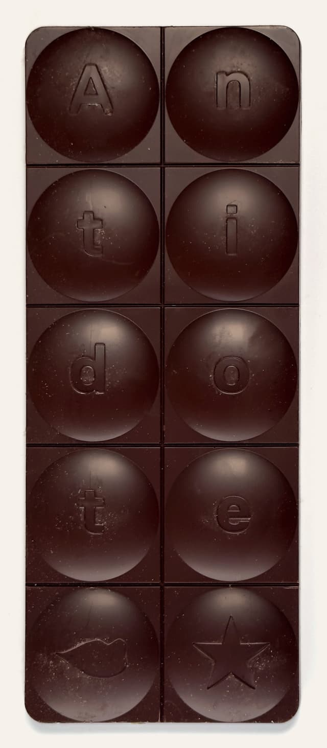 Front of Lavender Flowers + Red Salt bar from Antidote Chocolate with a custom branded bar
