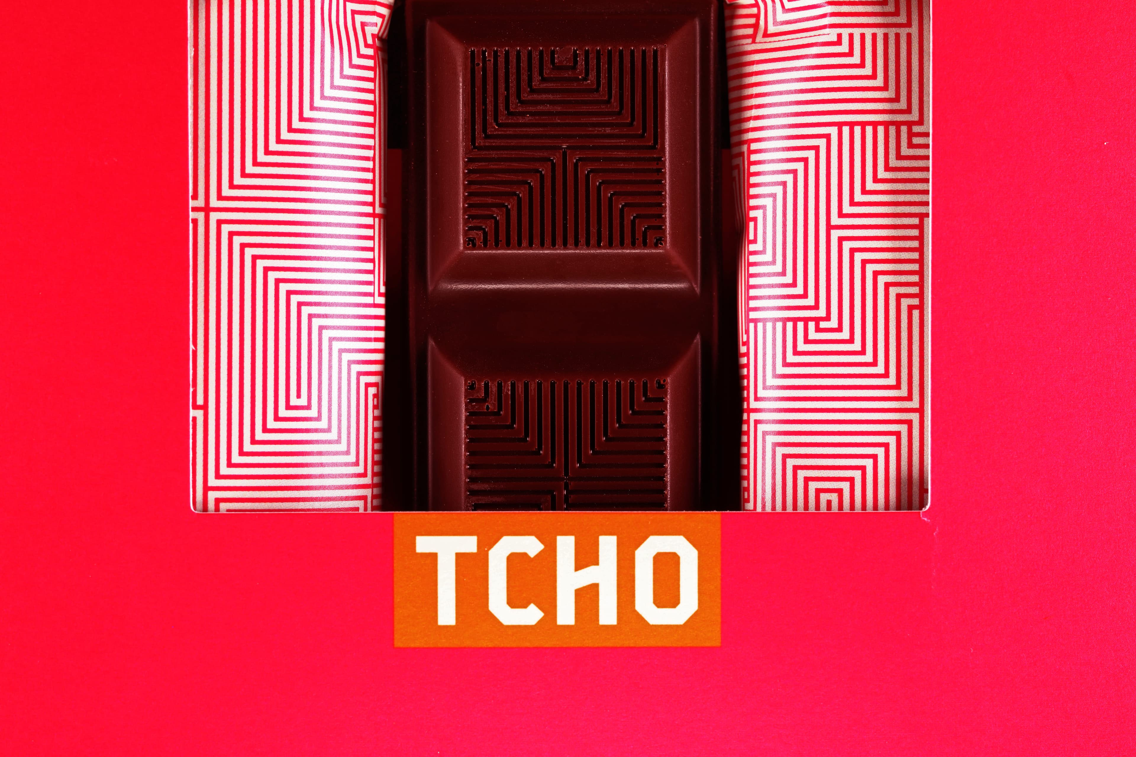 Born Fruity Lush & Fruity Cacao Truffle Filled Dark Chocolate bar made by TCHO in the United States macro shot of the bar inside the box packaging