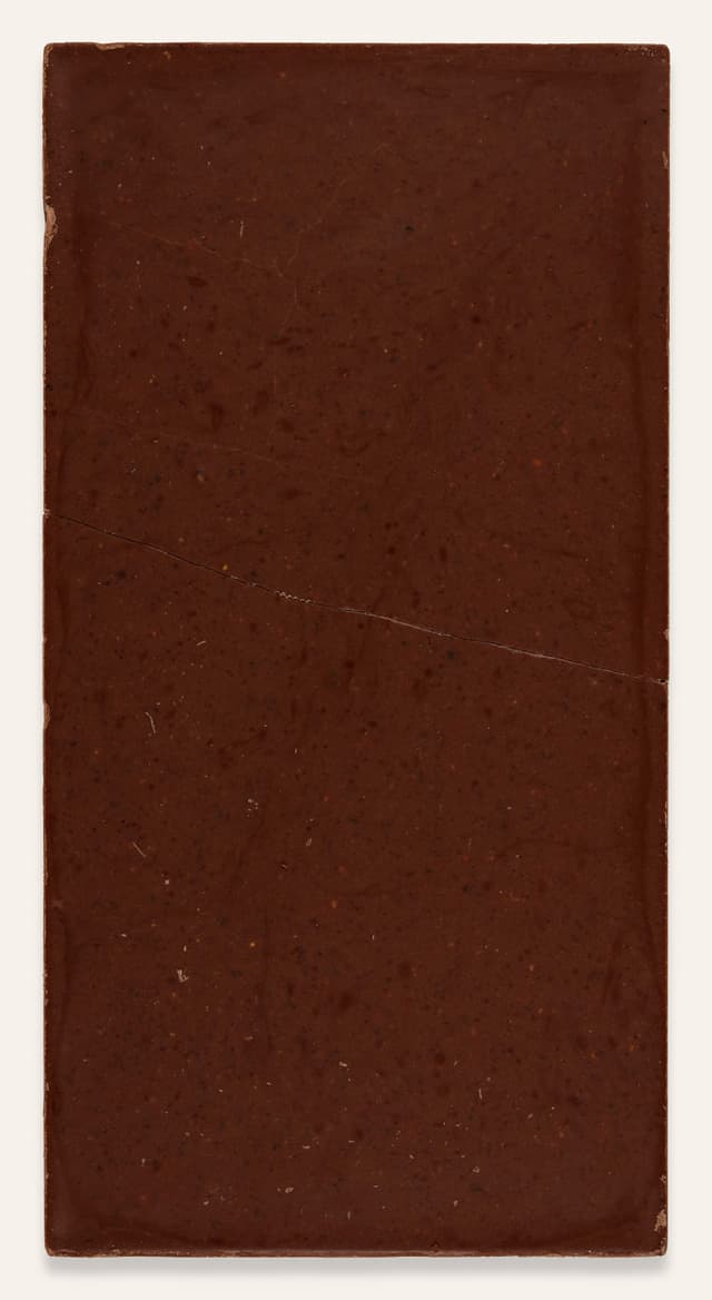 Back of Milk Chocolate with Loqaimat bar made by Mirzam Chocolate Makers in United Arab Emirates