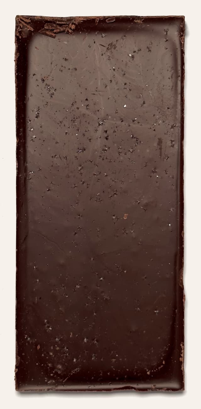 Back of Pink Sea Salt Unroasted Dark Chocolate bar from Raaka Chocolate