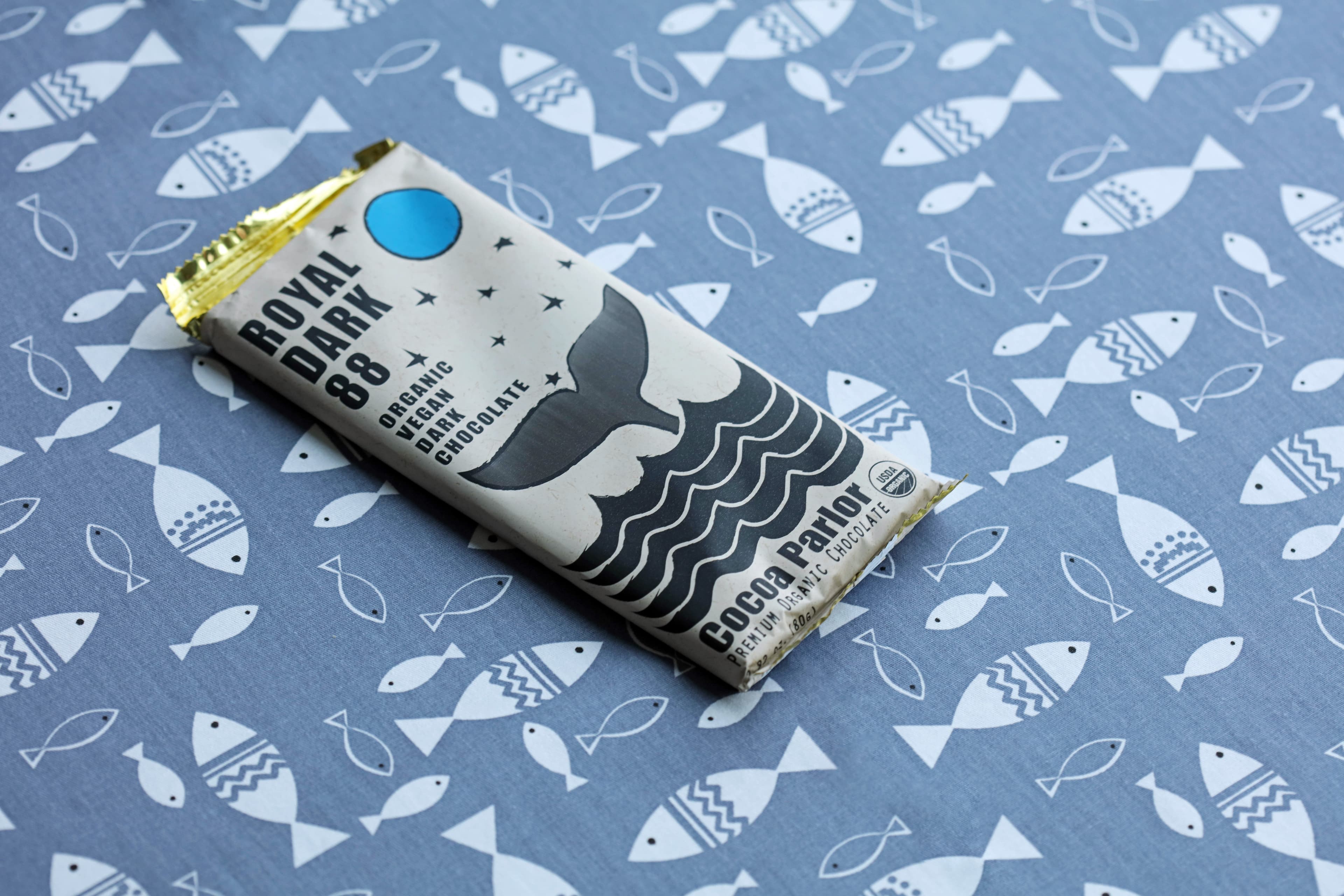 Royal Dark 88 bar made by Cocoa Parlor in the United States with a patterned fish background