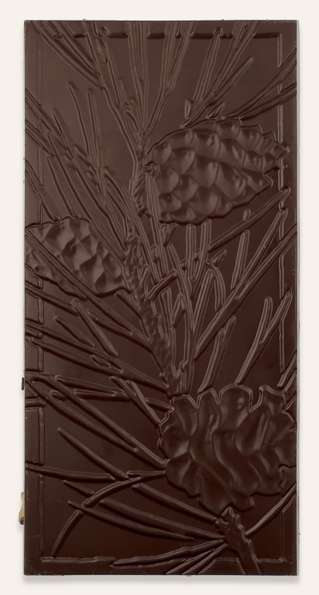 Back of Salted Brown Butter Texas Pecan Brittle bar made by Wildwood Chocolate in the United States