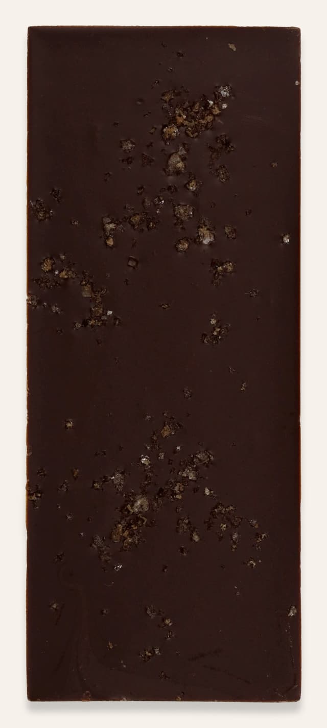 Back of Smoked Sea Salt 60% Dark Chocolate bar made by Lumineux Chocolate in the United States