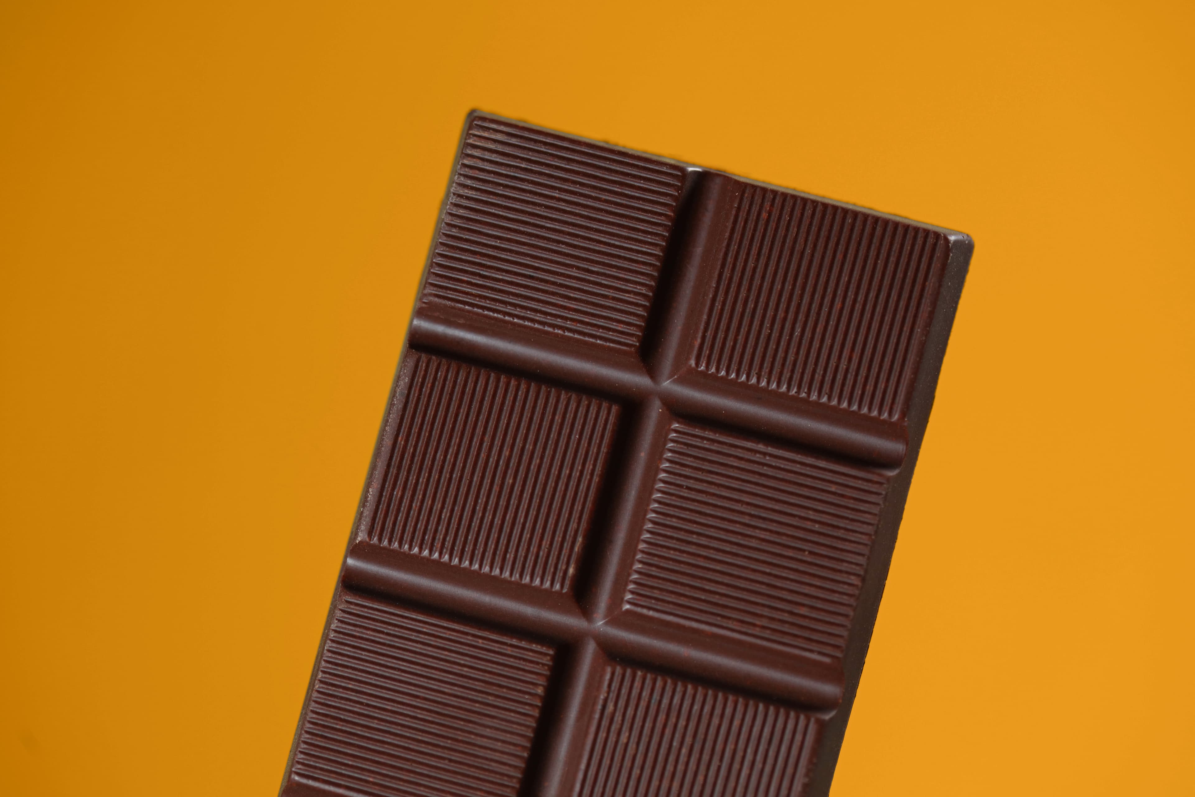 Taiwan #9 Ping Tung Double Ferment, Rough Ground Chocolate bar made by Fu Wan Chocolate in Taiwan close up macro shot