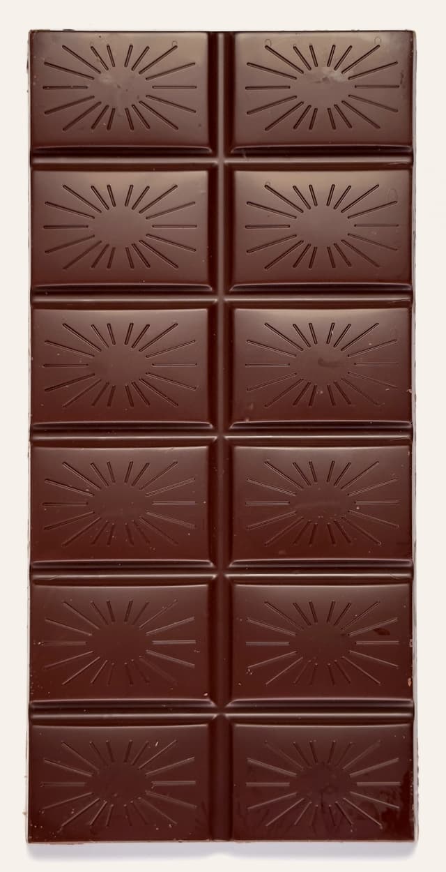 Front of Udzungwa 70% with Nibs Organic Vegan Dark bar from Original Beans with a radiating pattern